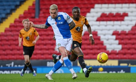 Sammie Szmodics of Blackburn Rovers scores his team's third goal to complete his hat-trick against Cambridge United.
