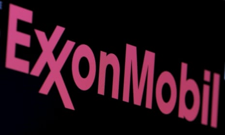 The logo of Exxon Mobil Corporation is shown on a monitor above the floor of the New York Stock Exchange in New York, December 30, 2015.
