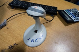 A barcode scanner marked ‘Belongs to Islamic State’ at Hiwa Jabari’s pharmacy in Jalawla, Iraq