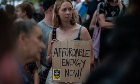 Activists attend a protest against energy prices in London.