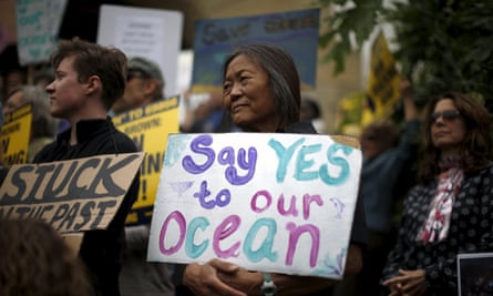 Protesters call for a ban on fracking and a phasing out of oil development in California, in Santa Barbara on Thursday.