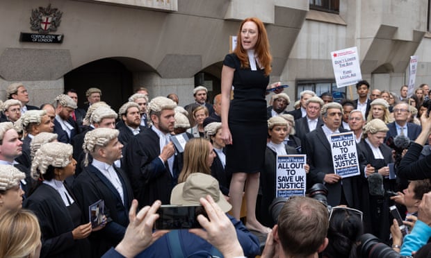 Lucie Wibberley, the assistant secretary of the Criminal Bar Association, speaking at the barristers’ strike over pay this week, outside the Old Bailey in London.