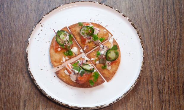 ‘Texturally, it’s a joy’: salmon sashimi ‘pizza’.