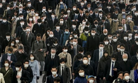 Commuters in Tokyo on Tuesday morning.