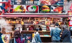 People buying from popular Kobe burger takeaway.