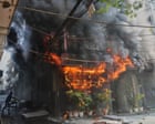 Delhi fire blazes through hotel building – video