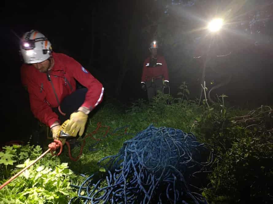 Rescuers with technical rescue rope to pull a person out safety.