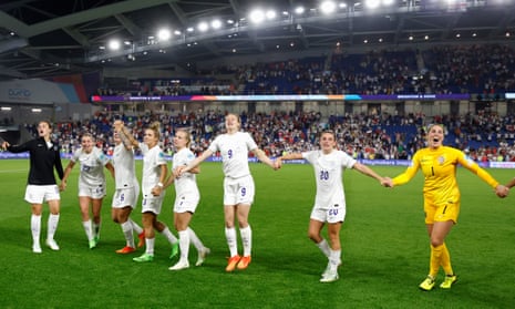 England players salute the fans after beating Spain 2-1 in extra time
