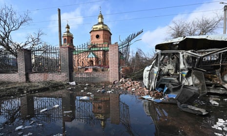 This photograph taken in Vovchans'k, Kharkiv region on March 9, 2023, shows a destroyed car, amid the Russian invasion of Ukraine.
