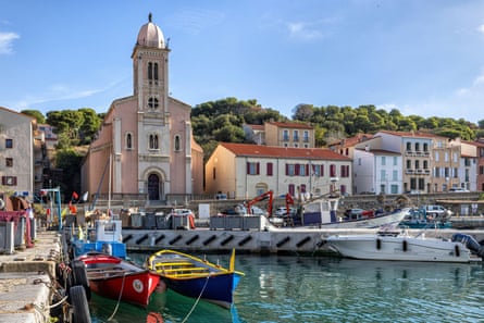Church and harbor of a small town on the Mediterranean sea