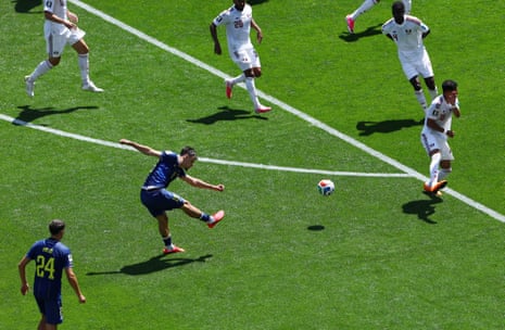 Bosnia and Herzegovina’s Kerim Alajbegovic scores their first goal.