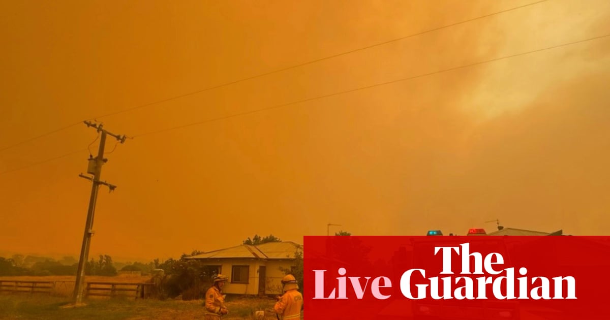 Australia news live: black Saturday-affected towns told to leave before predicted wind change causes ‘dangerous’ fire conditions