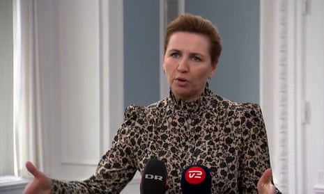 Mette Frederiksen speaking into a microphone