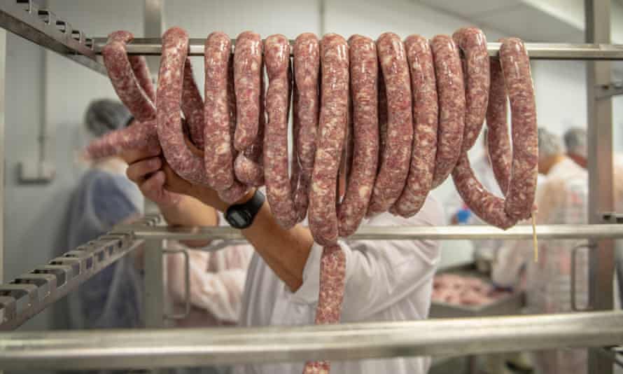 Links of sausage hung on a rack. The Netherlands is the largest meat exporter in the EU, with most going to the UK and Germany