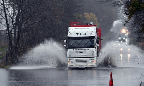 A lorry negotiates flooding on the A921 between Dalgety Bay and Aberdour on Friday.