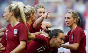 Ellen White of England celebrates scoring.