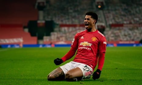 Marcus Rashford celebrates his late winner against Wolves which puts Manchester United on Liverpool’s tail.