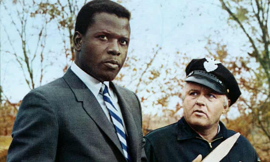 Poitier with Rod Steiger in a still from In the Heat of the Night.