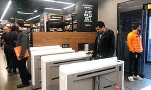 A shopper enters the Amazon Go store in Seattle, Washington, US