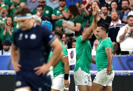 Ireland's James Lowe celebrates scoring their first try with Johnny Sexton.