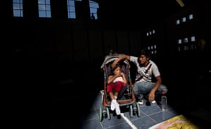 Lesly, six, sits in her stroller. She has cerebral palsy and can’t walk.