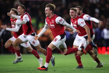 Fleetwood players celebrate after their shock shootout win against Arsenal