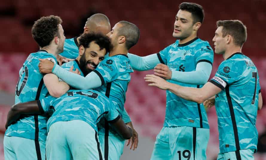 Mohamed Salah is congratulated after scoring Liverpool’s second goal