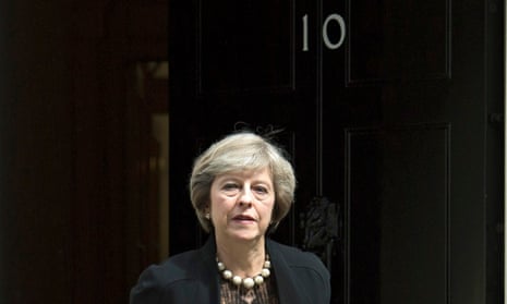 Theresa May leaving No 10 Downing Street after a cabinet meeting.