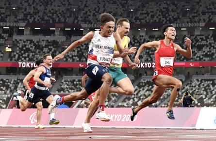 Thomas Young crosses the line to win the T38 men’s 100m at the Tokyo 2020 Paralympic Games.