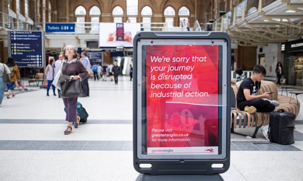A sign displays an apology from Greater Anglia at London Liverpool Street