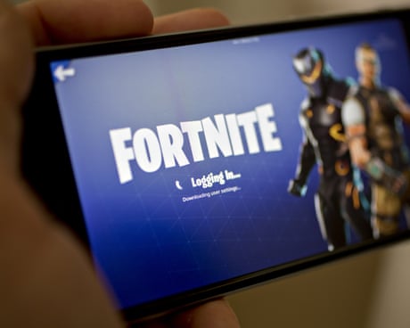 an iPhone displays the game Fortnite