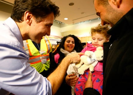 Syrian refugees are greeted by Canada’s Prime Minister Justin Trudeau on their arrival from Beirut at the Toronto Pearson International Airport.