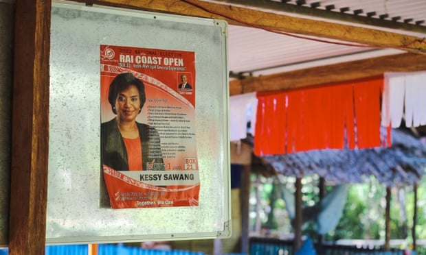 A poster for Kessy Sawang for the Madang Rai coast seat hangs in her village