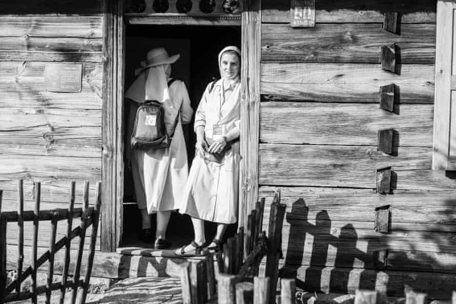 Maurzyce, Poland, July 2016 Sister Francesca poses in the wooden village during World Catholic Youth Week. Francesca was one of the youngest nuns inside the community. In 2017 she abandoned the community to return to a secular life.