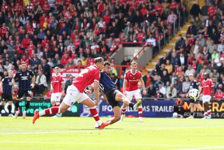 David Strelec watches the ball head for the net after stretching to score Middlesbrough’s second goal.