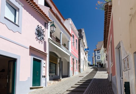 Colourful houses on a steep hill.
