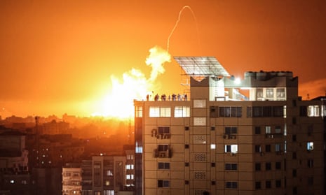 Fire and smoke rise in the central Gaza Strip after an Israeli airstrike on 7 April. 