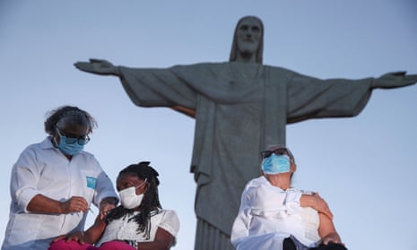 Rio de Janeiro began its vaccination campaign with a televised ceremony – and jabs – beneath the famous Christ the Redeemer statue overlooking the city.