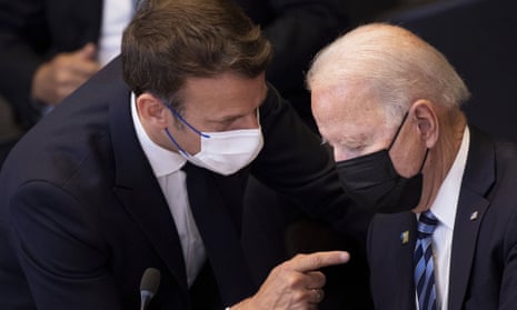 Joe Biden speaking with Emmanuel Macron at a Nato summit
