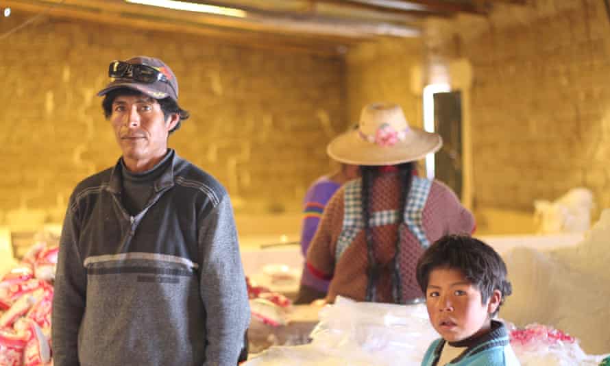 Aureliano Mauricio Valero and family work collecting salt at Colchani, having been displaced from Lake Poopó 150km to the north.