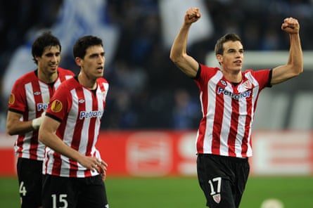 Iñigo Pérez celebrates a goal with Athletic Bilbao teammates, including Andoni Iraola in the Europa League in March 2012