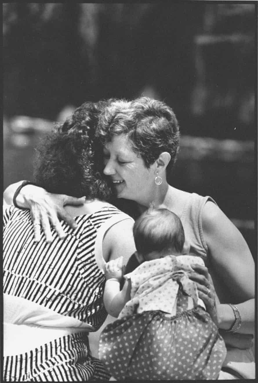 Norma McCorvey – aka Jane Roe in the Roe v Wade case – hugs her daughter Cheryl while holding her baby granddaughter outside at hotel.
