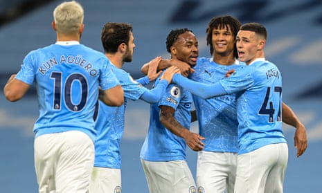 Manchester City celebrate after the decisive goal against Arsenal.