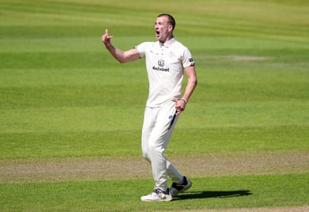 Blair Tickner celebrates tacking the wicket of Lancashire’s Keaton Jennings (not pictured) on day one of the Rothesay County Championship match at Old Trafford, Manchester in May 2025.