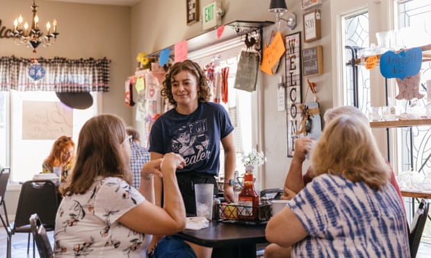 Samatha Turrentine chats with a table of guests during the last day DeDe’s was open to the public.