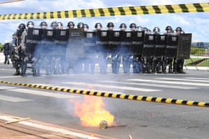 Riot police are seen during clashes in a protest against the labor and social security reforms and the government of President Michel Temer in Brasilia, Brazil
