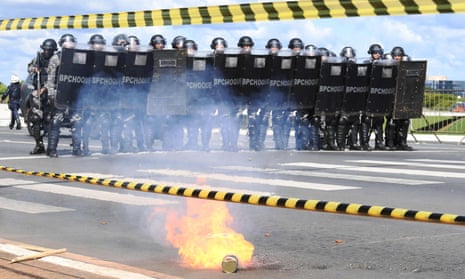 Riot police monitor protests against the government of Michel Temer in Brasilia, May 2017