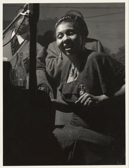 Singer Camille Howard performs on stage.