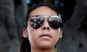 A crowd of Deferred Action for Childhood Arrivals (Daca) program supporters is reflected in Rosario Lopez’s glasses during a protest on Olivera Street in Los Angeles, California, in 2017. 