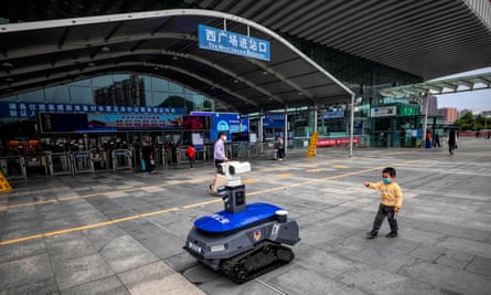 A police robot enforcing coronavirus rules in Shenzhen, China in March 2020.